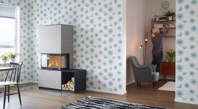 Die moderne und puristische Sichtbetonverkleidung „Artstone Naturell“ verleiht dem Heizeinsatz eine kühle Eleganz.