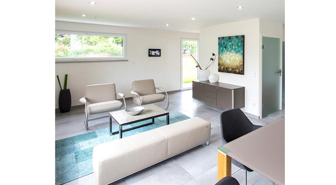 Wohnbereich ICON Winkelbungalow von Dennert Massivhaus