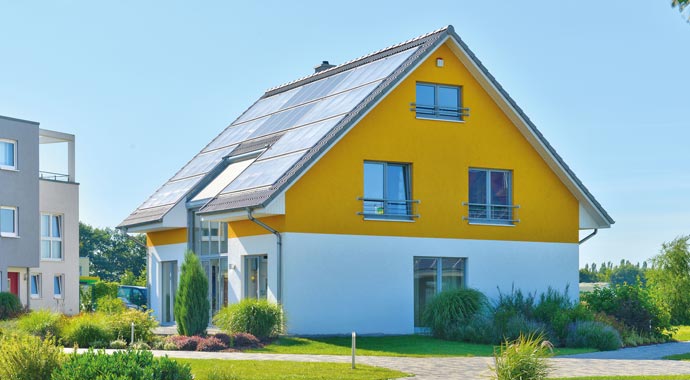 Helma Eigenheimbau Musterhaus Leipzig als Sonnenhaus Außenansicht