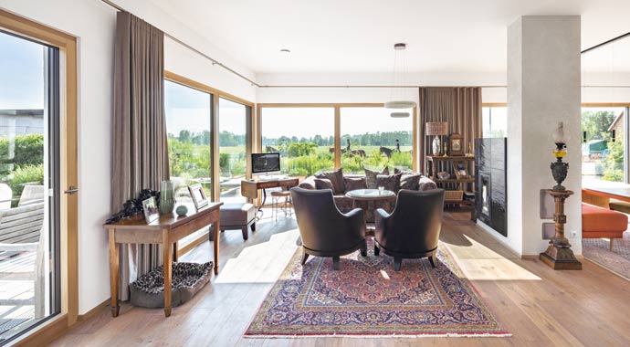 Wohnbereich Familien-Bungalow im Grünen von WeberHaus