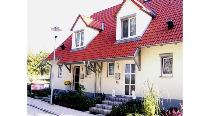 Town & Country Haus: Musterhaus Doppelhaus Duett 115 Trend