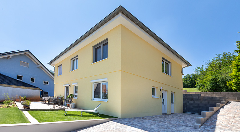 Zweifamilienhaus in Hanglage von TALBAU-Haus