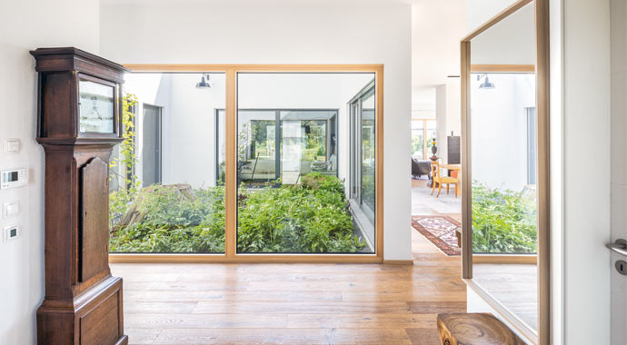 Wohnbereich Familien-Bungalow im Grünen von WeberHaus