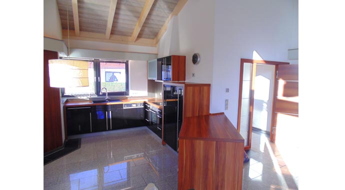 Tirolia-Blockhaus Musterhaus Tec-Wood Küche