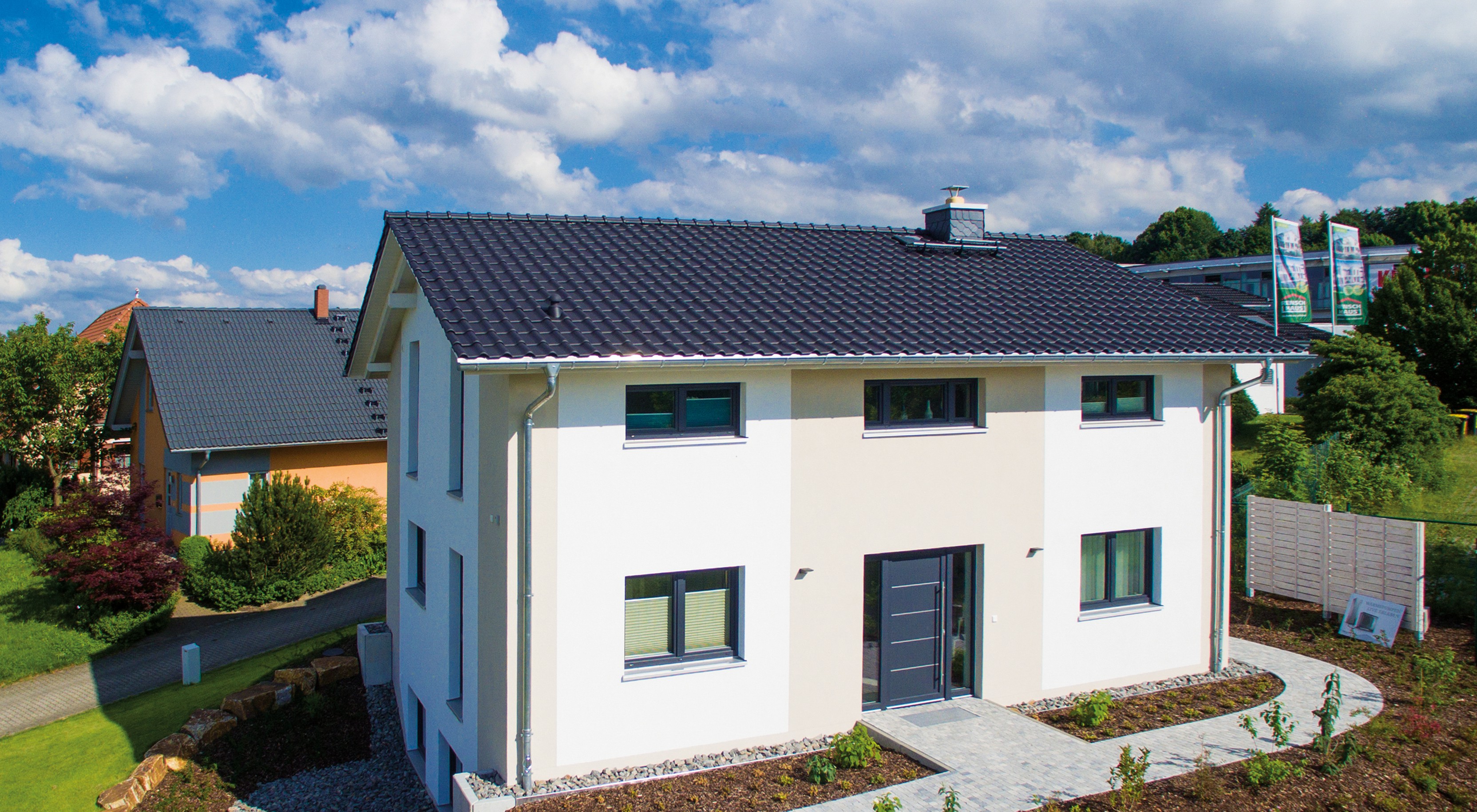 Helma Eigenheimbau Musterhaus als Sonderplanung Außenansicht