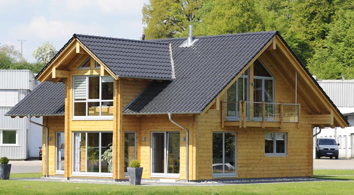 Fullwood Wohnblockhaus Musterhaus Haus SommerwieseAußenansicht
