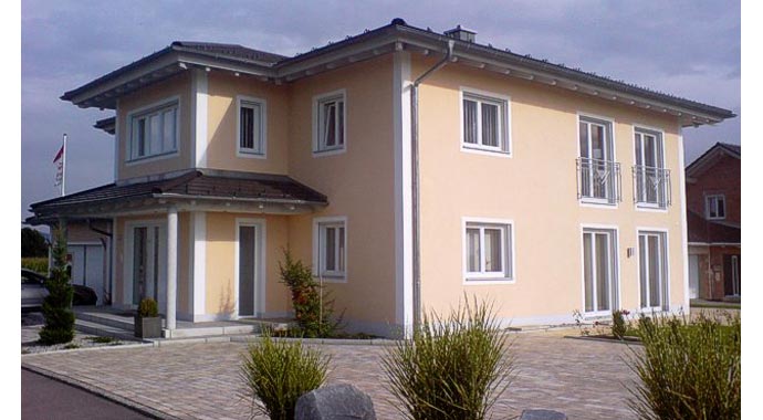 Town & Country Haus Musterhaus freigeplante Stadtvilla Außenansicht