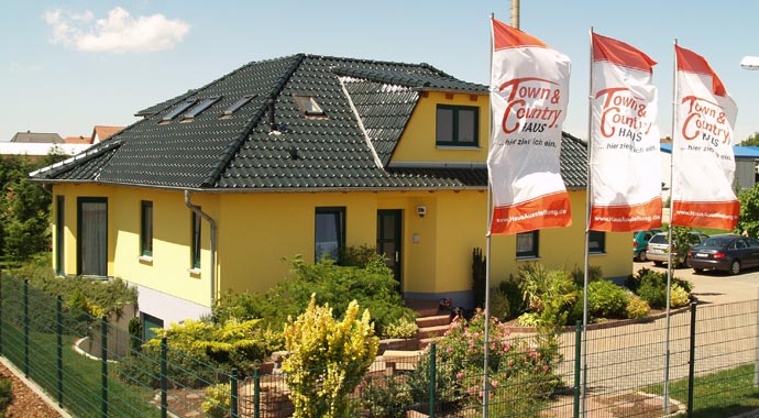 Town & Country Haus Musterhaus Winkelbungalow 108 Außenansicht